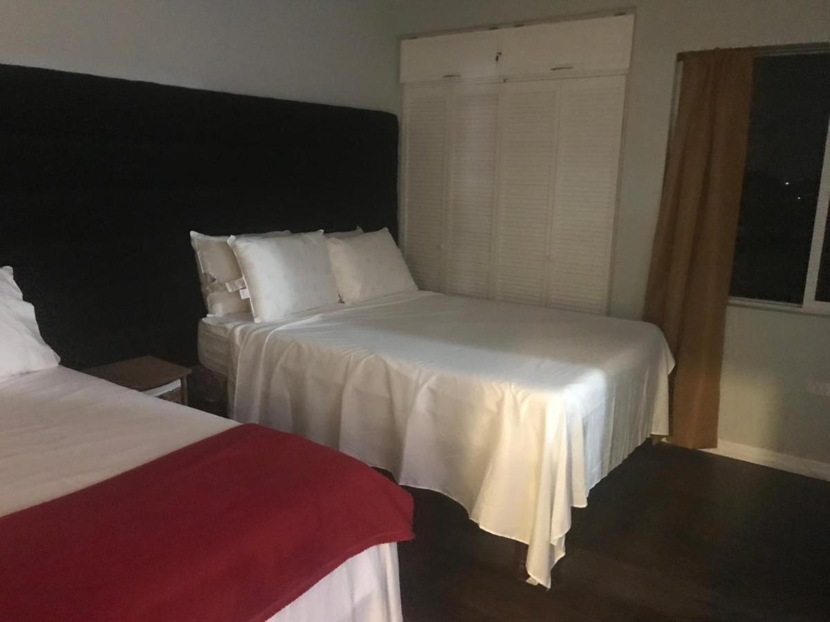 Abacus Jamaica The Zana Suites Kingston Bagian luar foto
